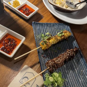 Taberu - Chicken thigh satay (3/5 seemed a tiny bit undercooked, good flavor) and yaki niku (favorite skewer, ordered a second one) - Ramen Near Me - Los Angeles, California Taberu - Chicken thigh satay (3/5 seemed a tiny bit undercooked, good flavor) and yaki niku (favorite skewer, ordered a second one) - Ramen Near Me - Los Angeles, California