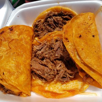 El Cabo Pepe's - Pepe's Red Tacos - Sample plate: 4 tacos and a bunch of sides; 2 hot sauces (one has a lime flavor), beef broth dip,  onions/cilantro, radish slices & limes - Tacos Near Me - Pasadena, California