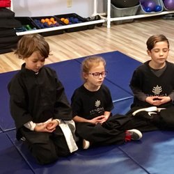 Kundala Tao Sanctuary - Youth Shaolin student practicing Taoist meditation exercises.