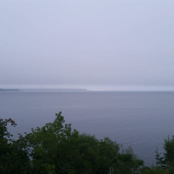 Seagull Bay Motel - Foggy morning from the deck overlooking Lake Superior. - Hotels Near Me - Bayfield, Wisconsin Seagull Bay Motel - Foggy morning from the deck overlooking Lake Superior. - Hotels Near Me - Bayfield, Wisconsin