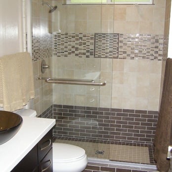 Designtree Studio - Deborah S. Taylor - Bath with vessel sink and glass shower door. Beige and brown tile in different shapes - Interior Design Near Me - San Francisco, California Designtree Studio - Deborah S. Taylor - Bath with vessel sink and glass shower door. Beige and brown tile in different shapes - Interior Design Near Me - San Francisco, California