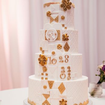 Sweet Traders - a white wedding cake with gold decorations - Bakeries Near Me - Huntington Beach, California Sweet Traders - a white wedding cake with gold decorations - Bakeries Near Me - Huntington Beach, California