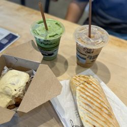 Arête - Iced matcha latte, brown sugar latte Sasquatch breakfast burrito + sour cream + sriracha aïoli + caramelized onions, cinnamon roll