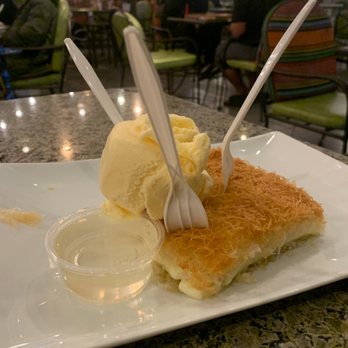 Nubia Cafe - Kunafe with ice cream side of syrup - Middle Eastern Near Me - Anaheim, California Nubia Cafe - Kunafe with ice cream side of syrup - Middle Eastern Near Me - Anaheim, California