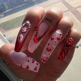 Cute little V-Day nails done by my Ann. She is the greatest at her work. I love how she upgraded her shop as well. Beautiful touch