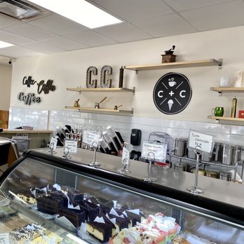 Coffee + Cream - a display of pastries in a bakery - Coffee & Tea Near Me - Livonia, Michigan