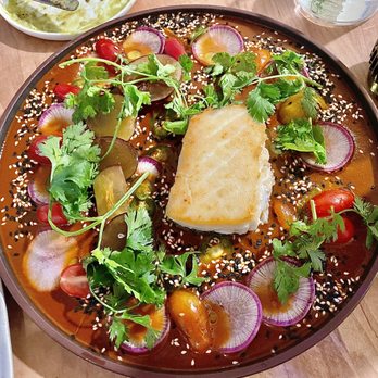 Amparo Fondita - Pescado en Mole Coloradito - Pan-Seared Halibut Filet, Amparo's Red Mole - Mexican Near Me - Washington, DC, District of Columbia