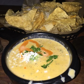 Torchy's Tacos - Green chile queso chips! - Tex-Mex Near Me - Round Rock, Texas