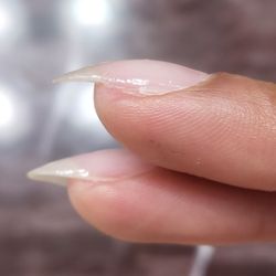 Oceanshine Salon & Day Spa - Most of my nails were cut and filled down this short on the sides by the man who works here.