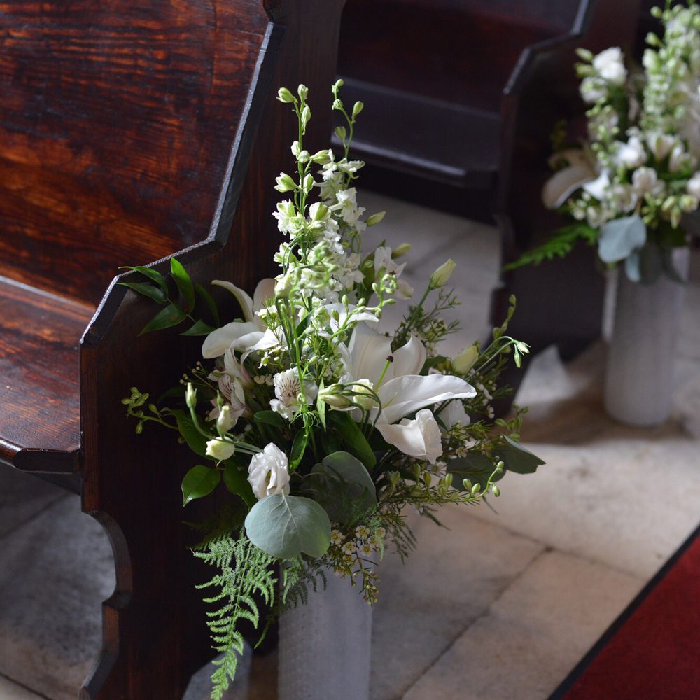 Pew arrangements by CM Bloomers