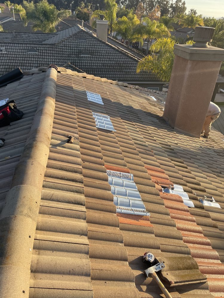 Slide of Venture Roofing