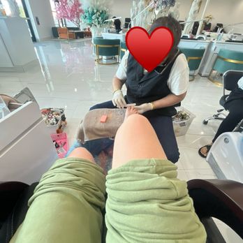 Marina Nail Lounge - Nail technician talking on cell phone - Nail Salons Near Me - Cibolo, Texas Marina Nail Lounge - Nail technician talking on cell phone - Nail Salons Near Me - Cibolo, Texas