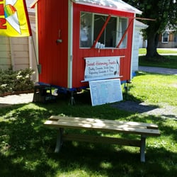 Sweet Harmony Treats - Beautiful day to rest on the benches in front of the cute stand.