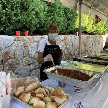 Happy Hostess At Your Service - Serving delicious food to guests - Bartenders Near Me Happy Hostess At Your Service - Serving delicious food to guests - Bartenders Near Me