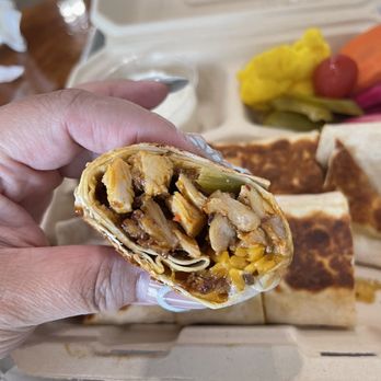 Shawarmaji - inside of the cut wrap - Middle Eastern Near Me - Santa Clara, California Shawarmaji - inside of the cut wrap - Middle Eastern Near Me - Santa Clara, California
