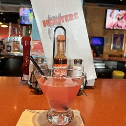 a drink in a glass on a table