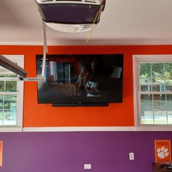 BroadTasking - Mounted a TV in a sports themed garage