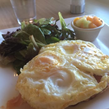 Del Ray Cafe - 2 eggs over easy with greens & bucheron cheese on croissant. - French Near Me - Alexandria, Virginia Del Ray Cafe - 2 eggs over easy with greens & bucheron cheese on croissant. - French Near Me - Alexandria, Virginia