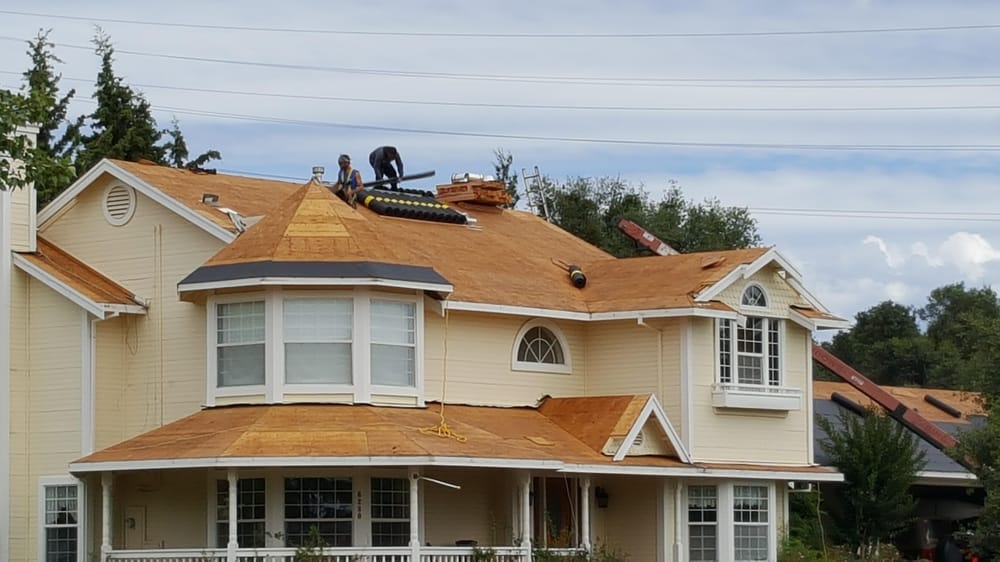 Slide of Mountain Roofing Systems