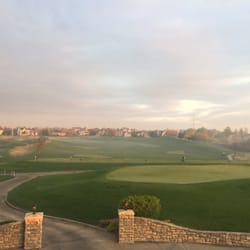 Tiffany Greens Golf Club - The range. Note the tree in the middle as a target. It was safe from me.