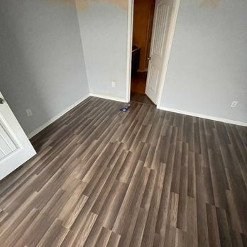 THA Construction & Remodeling - empty room with hard wood floors - General Contractors Near Me - Austin , Texas THA Construction & Remodeling - empty room with hard wood floors - General Contractors Near Me - Austin , Texas