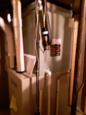 Malone's Heating Cooling Plumbing & Remodeling Logo