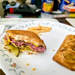 Quarter Pounder with Cheese undercooked and cold. Apple pie cold. Quarter Pounder with Cheese undercooked and cold. Apple pie cold.