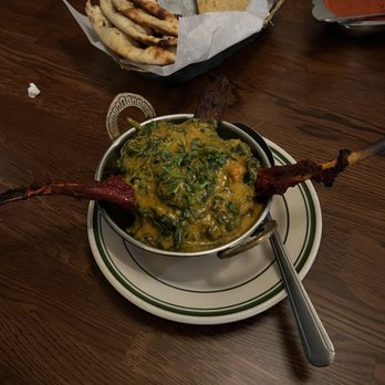 Maharani India Restaurant - a bowl of food on a table - Indian Near Me - Elk Grove, California