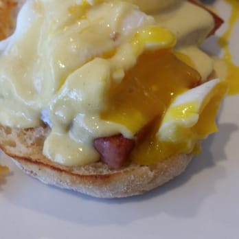 Break Your Fast - Close up view of the SPAM Benedict with the egg yolk over the spam - American Near Me - Union City, California Break Your Fast - Close up view of the SPAM Benedict with the egg yolk over the spam - American Near Me - Union City, California