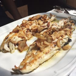 El Puerto - Idk wtf fish this is but its spanish fish with garlic and its yummy.