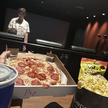 Regal Westgate - Pizza Combo (Drink, Pizza, Candy & Popcorn) - Cinema Near Me - Austin, Texas