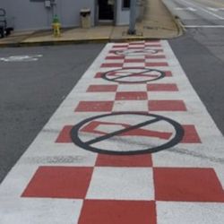 Yann's Hot Dog Stand - The street crossing to Yann's with a no ketchup warning. This is great.