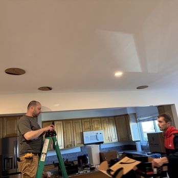 Big Ben Mounts - Hard at work installing the surround speakers - Electricians Near Me - Tarzana, California Big Ben Mounts - Hard at work installing the surround speakers - Electricians Near Me - Tarzana, California