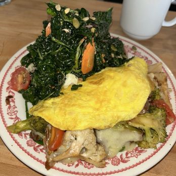Comfort & Floyd - Roasted vegetables and cheddar omelet (kale salad on the side) - Breakfast & Brunch Near Me - Philadelphia, Pennsylvania Comfort & Floyd - Roasted vegetables and cheddar omelet (kale salad on the side) - Breakfast & Brunch Near Me - Philadelphia, Pennsylvania