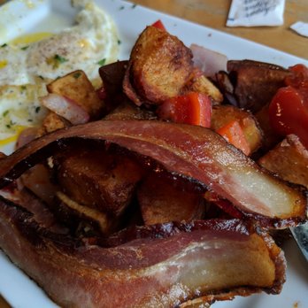 Kangaroo & Kiwi - Over medium eggs, perfect bacon and spuds. Sorry I couldn't help but take some bites as soon as I saw it. - Pubs Near Me - Seattle, Washington Kangaroo & Kiwi - Over medium eggs, perfect bacon and spuds. Sorry I couldn't help but take some bites as soon as I saw it. - Pubs Near Me - Seattle, Washington