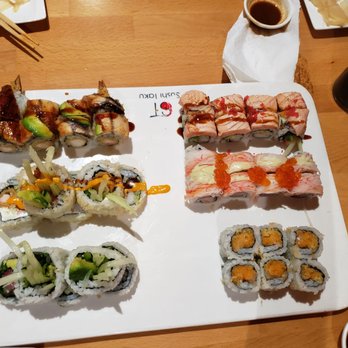 Sushi Taku - Left to right, top to bottom: Dragon roll, fire phoenix roll, godzilla roll, sunny roll, mexican roll, spicy scallop roll - Japanese Near Me - Chicago, Illinois Sushi Taku - Left to right, top to bottom: Dragon roll, fire phoenix roll, godzilla roll, sunny roll, mexican roll, spicy scallop roll - Japanese Near Me - Chicago, Illinois
