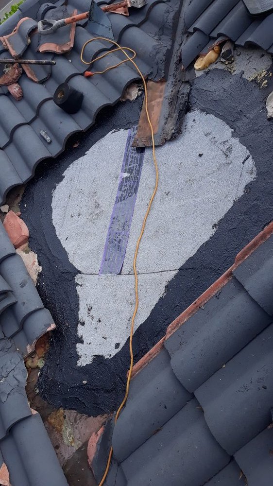 Slide of TK Roofing Contractor Miami