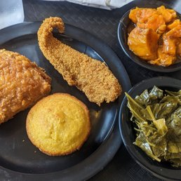 a plate of fried chicken, cornbreads, and greens a plate of fried chicken, cornbreads, and greens