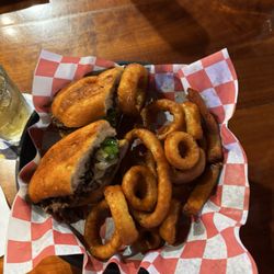Hibby’s Sports Grille - Smoked ribeye sandwich with onion rings