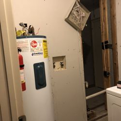 MR Universal Handyman Svcs - Water heater and wall installation