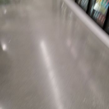 7-Eleven - a blurry photo of a grocery aisle - Convenience Stores Near Me - Laurens, South Carolina