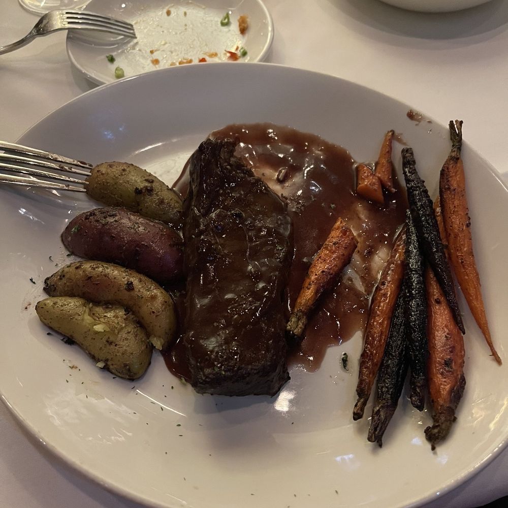 Sullivan's Steakhouse - Braised short rib with carrots and potatoes - Steakhouses Near Me - Tucson, Arizona Sullivan's Steakhouse - Braised short rib with carrots and potatoes - Steakhouses Near Me - Tucson, Arizona