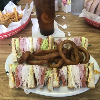 Mel's Southern Diner - a plate of sandwiches and onion rings - Diners Near Me - Hot Springs, Arkansas Mel's Southern Diner - a plate of sandwiches and onion rings - Diners Near Me - Hot Springs, Arkansas