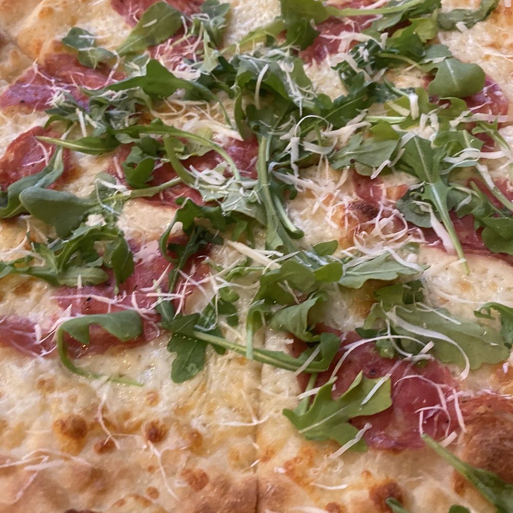 Yellow Bridge Brewing - a pizza topped with greens - Breweries Near Me - Delmont, Pennsylvania Yellow Bridge Brewing - a pizza topped with greens - Breweries Near Me - Delmont, Pennsylvania