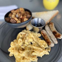 Pilot Light - Classic combo: 2 eggs to order, sausage (choice of bacon or ham available), potato hash, buttered sourdough