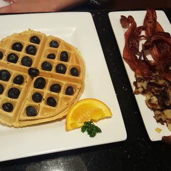 Keke's Breakfast Cafe - Blueberry waffle with potatoes and bacon - Breakfast & Brunch Near Me - Winter Park, Florida Keke's Breakfast Cafe - Blueberry waffle with potatoes and bacon - Breakfast & Brunch Near Me - Winter Park, Florida