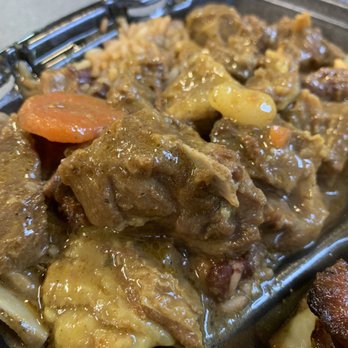 Careda's Caribbean Cuisine - Curried Goat lunch platter served with Rice and Beans, Cabbage and Plantains- delicious! - Caribbean Near Me - Philadelphia, Pennsylvania Careda's Caribbean Cuisine - Curried Goat lunch platter served with Rice and Beans, Cabbage and Plantains- delicious! - Caribbean Near Me - Philadelphia, Pennsylvania
