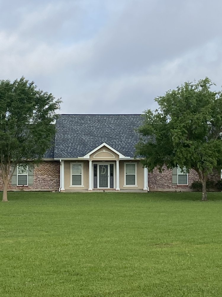 Slide of John Theriots Roofing