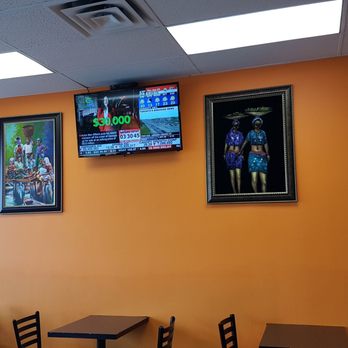 Tropical Island Caribbean Restaurant - Tv and beautiful art work - Caribbean Near Me - Vaughan, Ontario Tropical Island Caribbean Restaurant - Tv and beautiful art work - Caribbean Near Me - Vaughan, Ontario