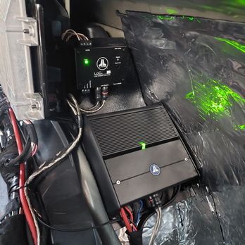 Custom Car Alarms - Rivian RS1 with JL Audio XDM 300/1 w/ a JL Audio L.O.C. 22 mounted behind factory amp on a custom amp rack - Car Stereo Installation Near Me - Pleasant Hill, California Custom Car Alarms - Rivian RS1 with JL Audio XDM 300/1 w/ a JL Audio L.O.C. 22 mounted behind factory amp on a custom amp rack - Car Stereo Installation Near Me - Pleasant Hill, California